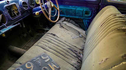 16903_The_ripped_upholstery_of_the_old_car.jpg