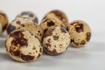 Obraz premium quail eggs isolated on white background. close up