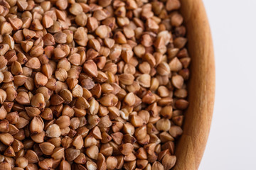 Grain buckwheat on a white acrylic background