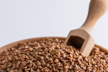Grain buckwheat on a white acrylic background