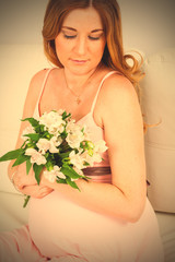 pregnant woman with flowers