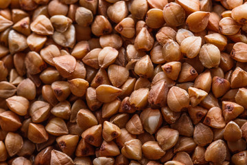 Grain buckwheat on a dark stone background