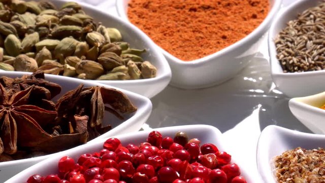 Spices. Various Indian. Spice and herbs rotate. Assortment of Seasonings, condiments. Cooking ingredients, flavor. 4K video Beautiful view