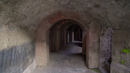 Fototapeta na wymiar 17239_The_dark_tunnel_under_the_ampitheatre_in_Pompeii_Italy.jpg