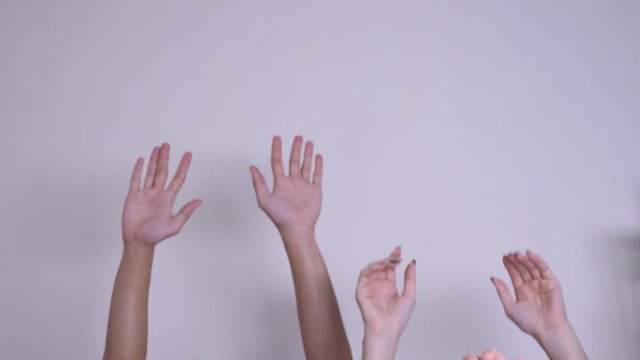 people democracy vote teamwork concept. crowd of people raised lifestyle their hands up expressing agreement and support. Volunteering or voting a teamwork