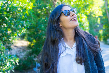 young indian woman smiling in the nature