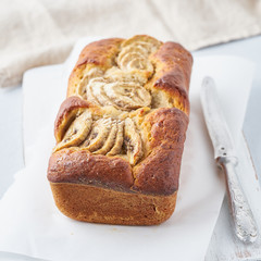 Banana bread, cake with banana. The morning Breakfast on light grey background