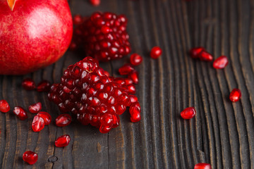 grains of a grenade on a dark rustic background