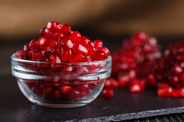 grains of a grenade on a dark rustic background