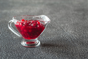 Cranberry sauce in glass gravy boat
