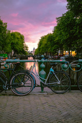 Fototapeta na wymiar Bicycle at the sunset in Amsterdam, Netherlands
