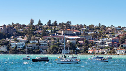 Panorama of Watsons Bay Australia as seen form the sea with sailing boats in the front