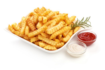 Fried French fries, potato fry with tomato sauce and mayonnaise, close-up, isolated on white background