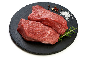 Raw beef for grill, BBQ or cooking, sliced fresh meat, close-up, isolated on white background