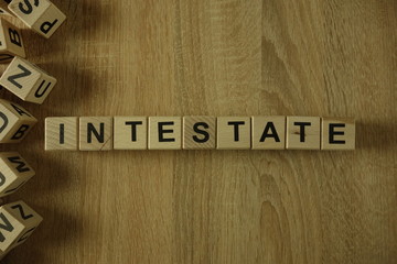 Intestate word from wooden blocks on desk