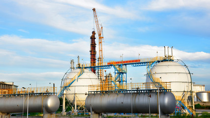 Refinery storage tanks ethanol tank under the blue sky white clouds