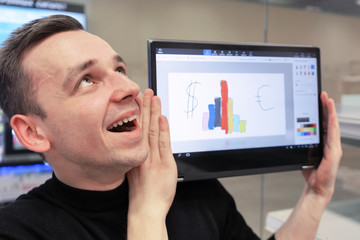 happy office guy and tablet with business chart