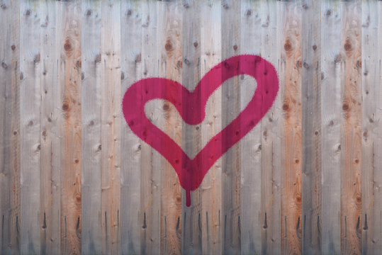 Spray Painted Heart on Fence