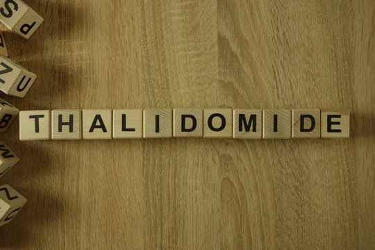 Thalidomide word from wooden blocks on desk