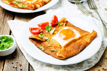 Buckwheat crepes with cheese and egg
