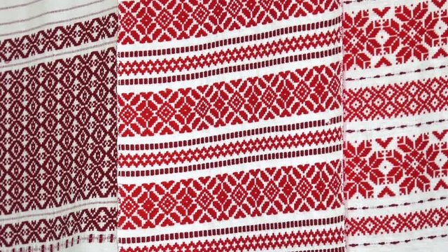 Traditional red and black patterns from the countryside. Hand woven fabric.
