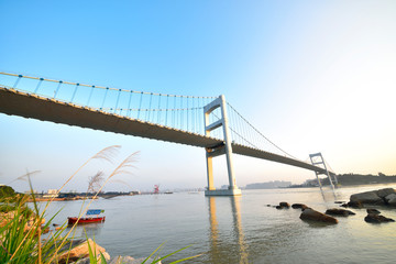 Fototapeta premium Urban traffic bridge on the water