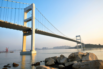 Urban traffic bridge on the water
