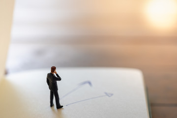 Business, strategy, Planning and job concept. Close up of businessman miniature figures standing on...