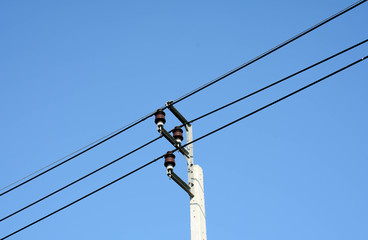 Electricity post on blue sky