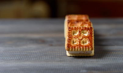 Cookies with marshmallows and marmalade on the table. Fresh homemade pastries