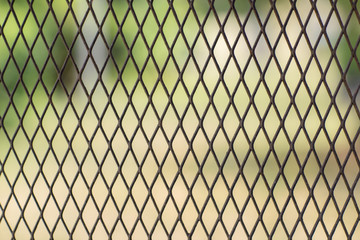 Iron wire fence. Fence grilles rust texture background. Fence Steel Background.