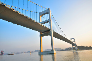 Urban traffic bridge on the water
