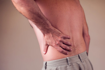 Naklejka premium Man with back pain. People, health care, medicine concept