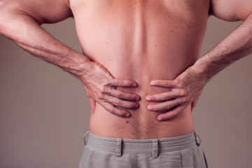 Man with back pain. People, health care, medicine concept