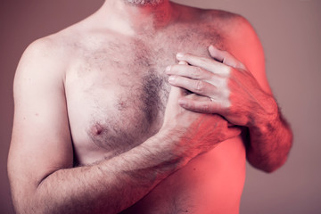 Naklejka premium Man having a heart attack. People, health care, medicine concept