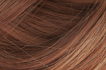 Henna hair as background, texture. One of the popular shades of hair coloring