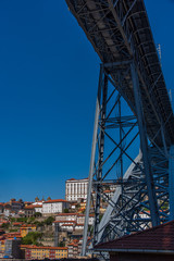 Fototapeta premium View of Dom Luis I bridge in Ribeira Porto in Portugal. The Ribeira zone in Porto is a World eritage zone