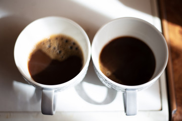 Close-up of two cups of coffee