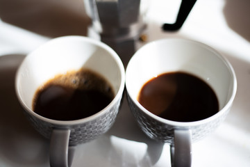 Close-up of two cups of coffee