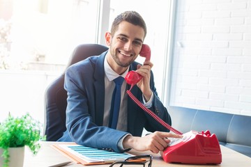 businessman or executive with vintage phone