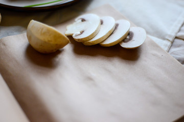 sliced chasmignons  on the craft paper of background