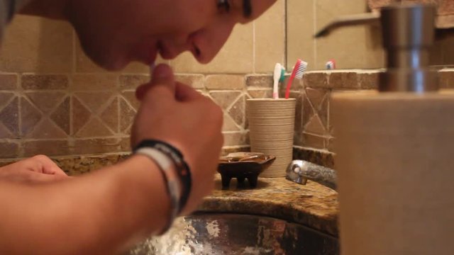 Person brushing their teeth