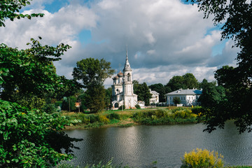 river and church in a small town