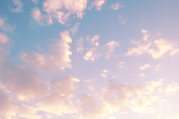 Pink, blue, purple evening sunset sky with cumulus clouds
