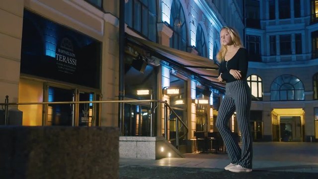 Woman Walking Fast At Night In The City, Paranoid She Is Being Followed, 60 Fps.