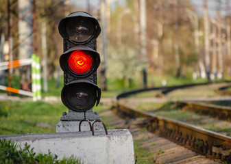 semaphore with a red signal near the railway