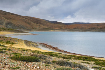 Great lakes of Tibet. Lake Rakshas Tal (Langa-TSO) in summer in cloudy day