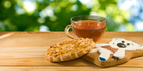 image of tea and cookies on the table