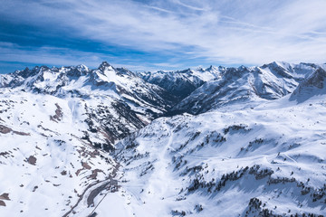 Fototapeta premium winter landscape with blue sky in austria by drone