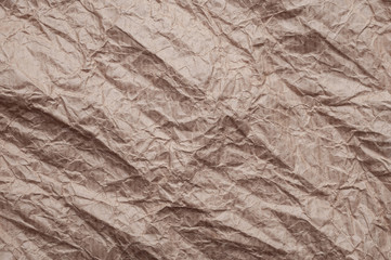Crumpled kraft paper. Texture crumpled recycled brown paper.